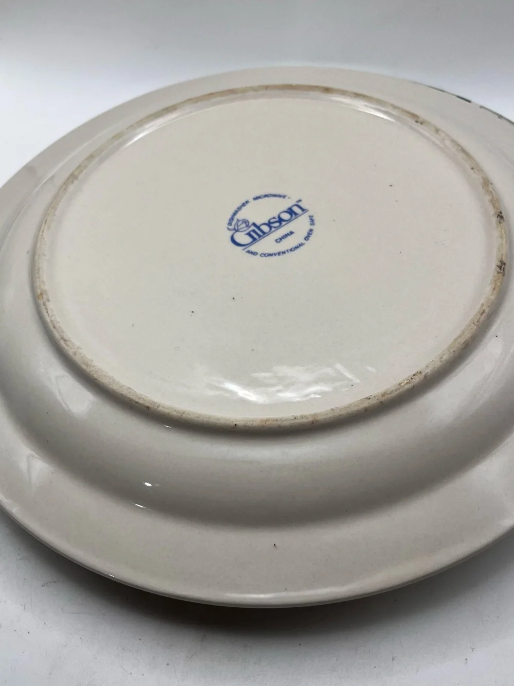 Gibson Cream Dinner Plate with Green Check Rim and Fruit Basket